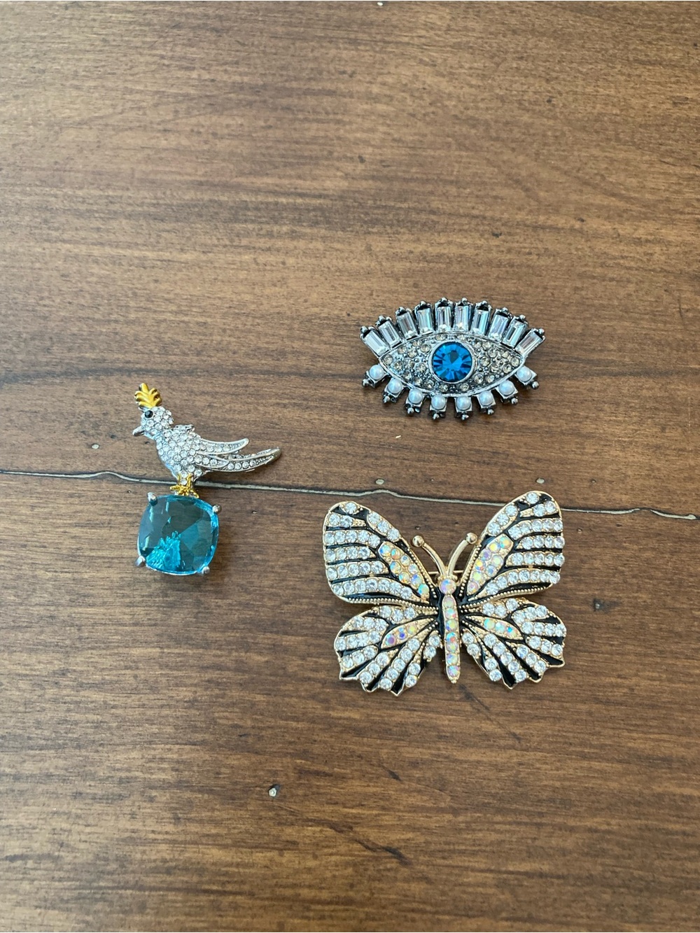 Three-Piece Women's crystal Brooch Set  evil eye, butterfly, & bird.